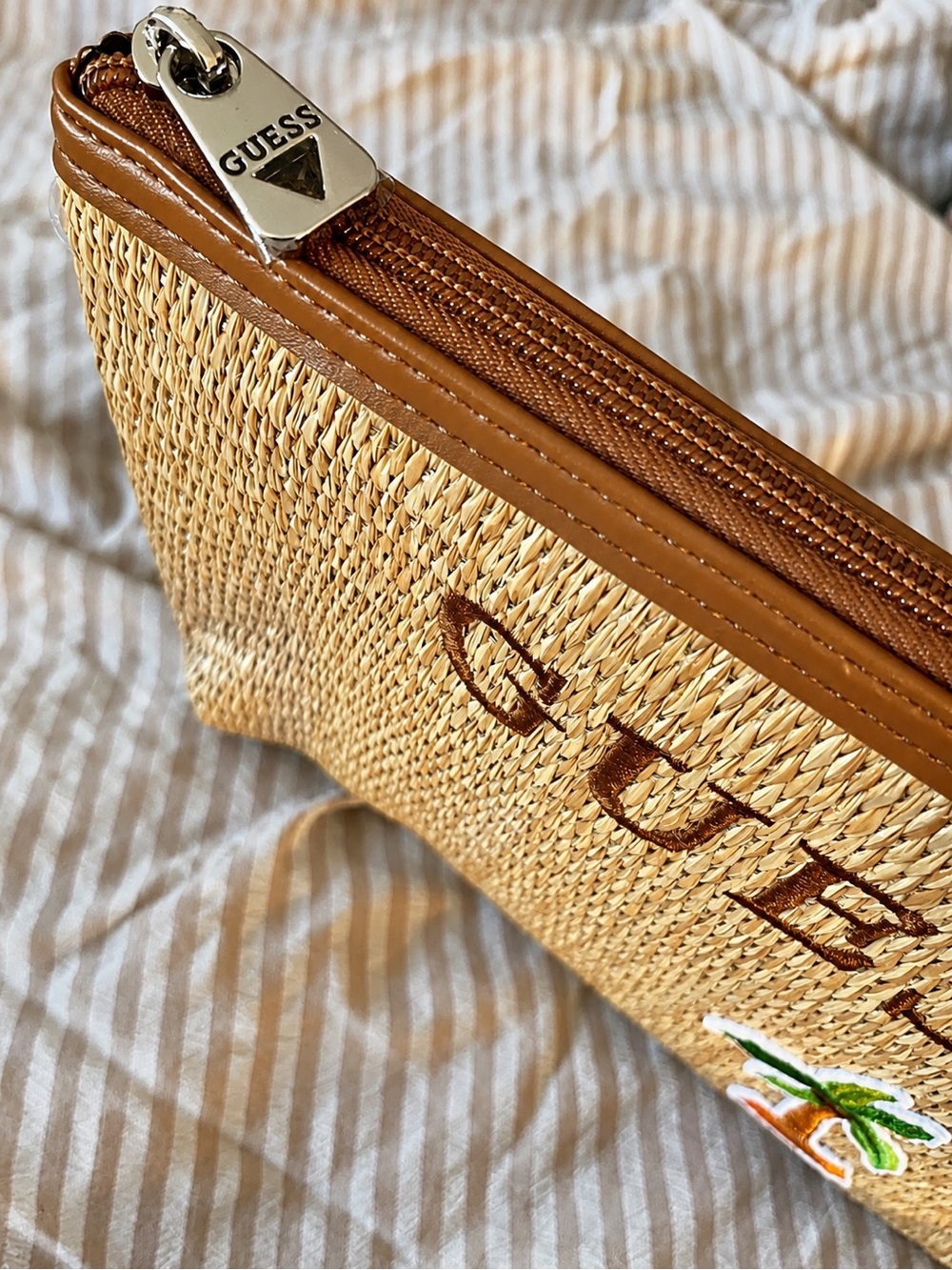 Guess Straw Zip Pouch in Tan and Brown with Embroidered Palm